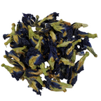 Dried blue pea flowers on a white background