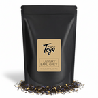 Black tea packaging with 'Tega' label on a white background