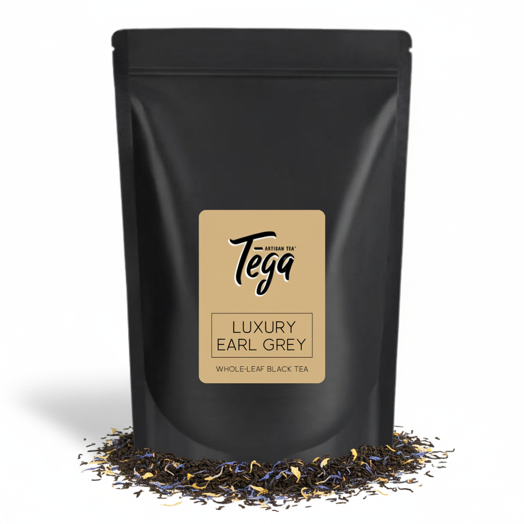 Black tea packaging with 'Tega' label on a white background