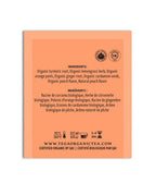 Tea bag label with ingredient list and branding on a white background