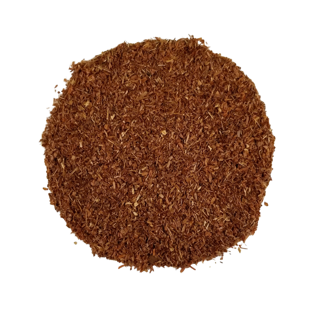 Round piece of brown material on a white background