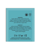 Tea package with ingredient list and branding on a light blue background