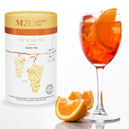 M21 Luxury Tea packaging with a glass of orange-colored drink and orange slices on a white background