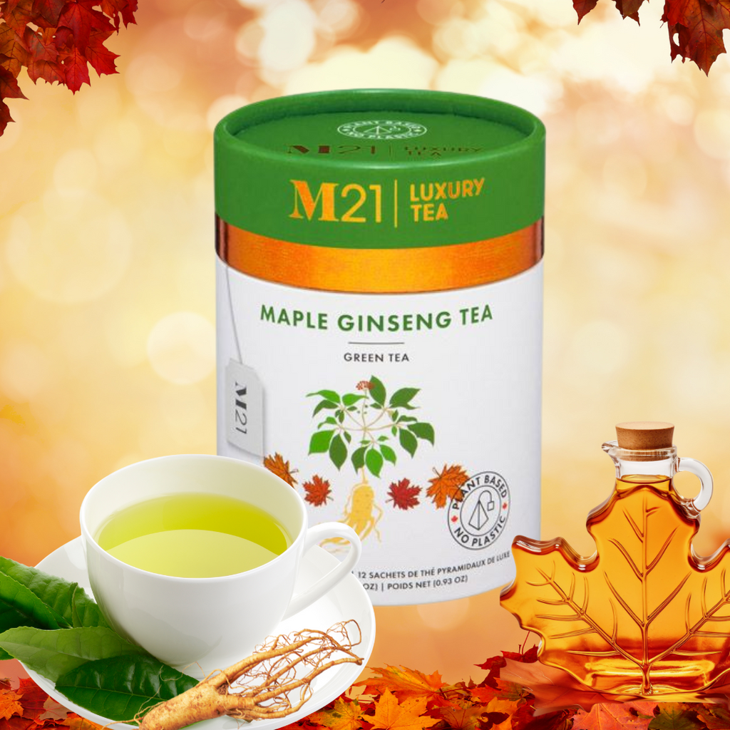 M21 Luxury Tea Maple Ginseng Tea can with a cup of tea, leaves, and syrup on a fall-themed background.