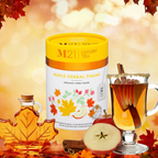 M21 Luxury Tea Maple Herbal Tisane with a glass of tea, maple syrup, and apples on an autumn-themed background.