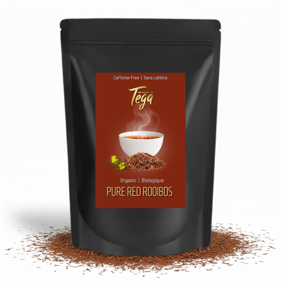 Black package of Tega Pure Red Rooibos with a label showing a cup of tea and text.