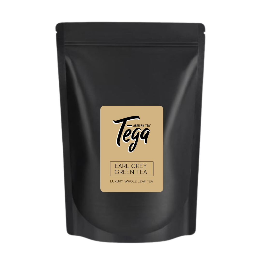 Black tea packaging with a gold label on a white background