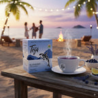 Tega tea packaging and cup on a beach table with a sunset background