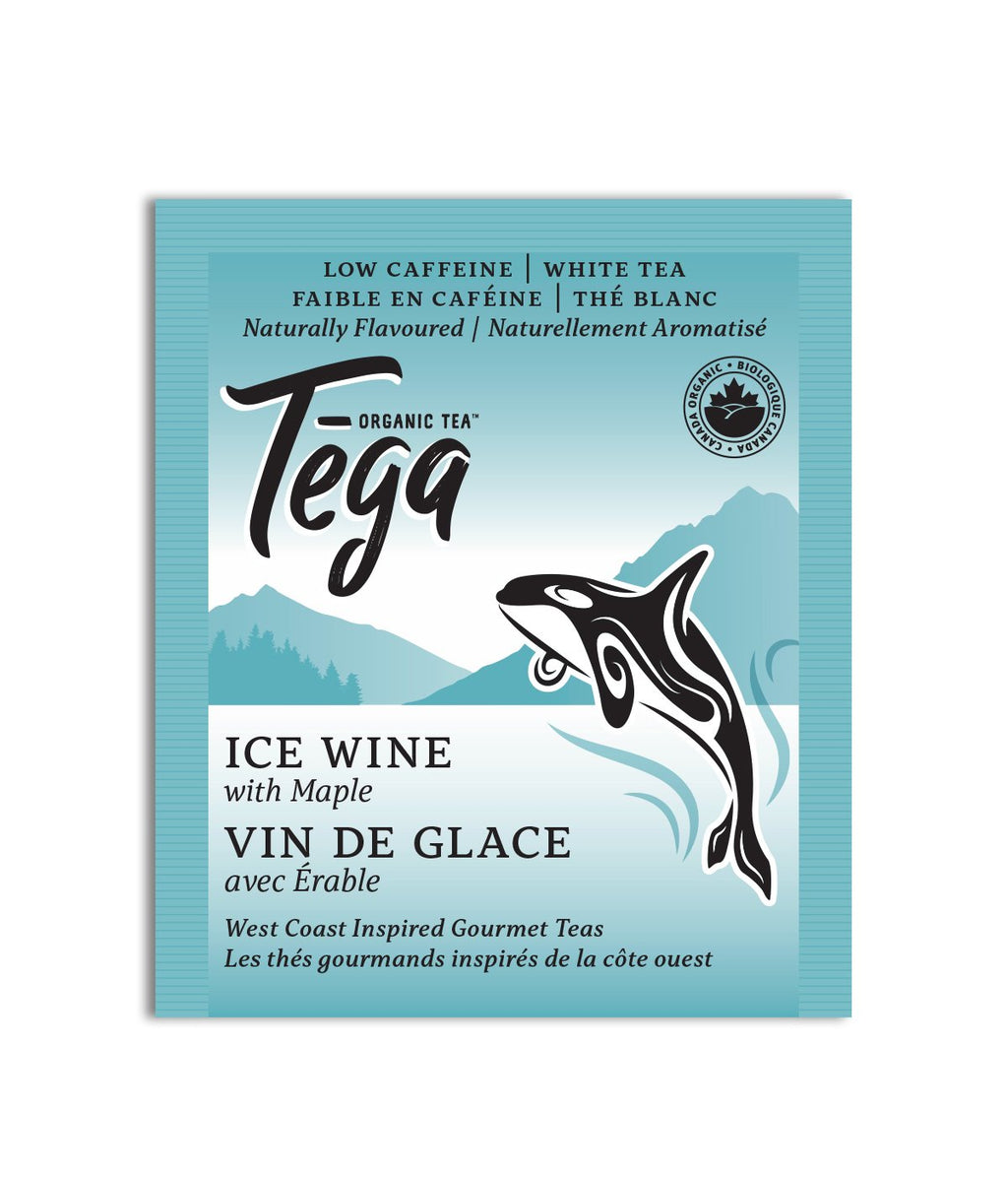 Tega Organic Tea package with a whale illustration on a blue background