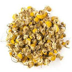 Bouquet of dried chamomile flowers on a white background