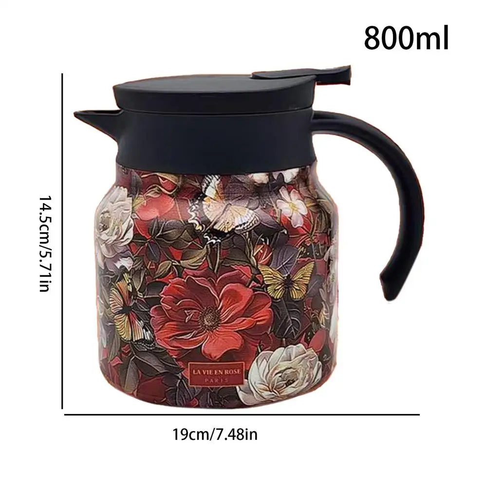 Floral-patterned teapot with black lid and handle, dimensions and capacity displayed.