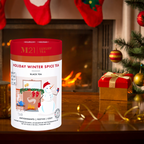 M21 Luxury Tea Holiday Winter Spice Tea canister with Christmas decorations and fireplace in the background