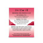 Tea packaging with brewing instructions and ingredient list on a pink background